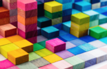 Stacked multi-colored wooden blocks