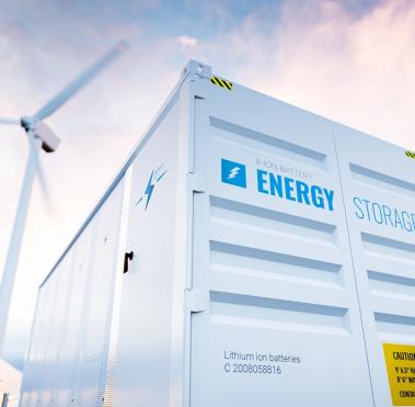 White containers with solar panel and wind turbine